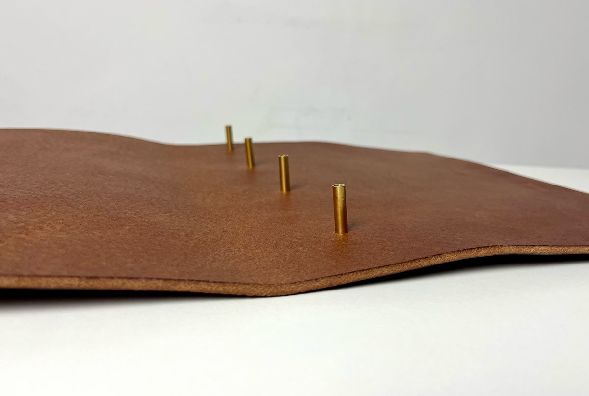 brown leather binder with brass screw posts
