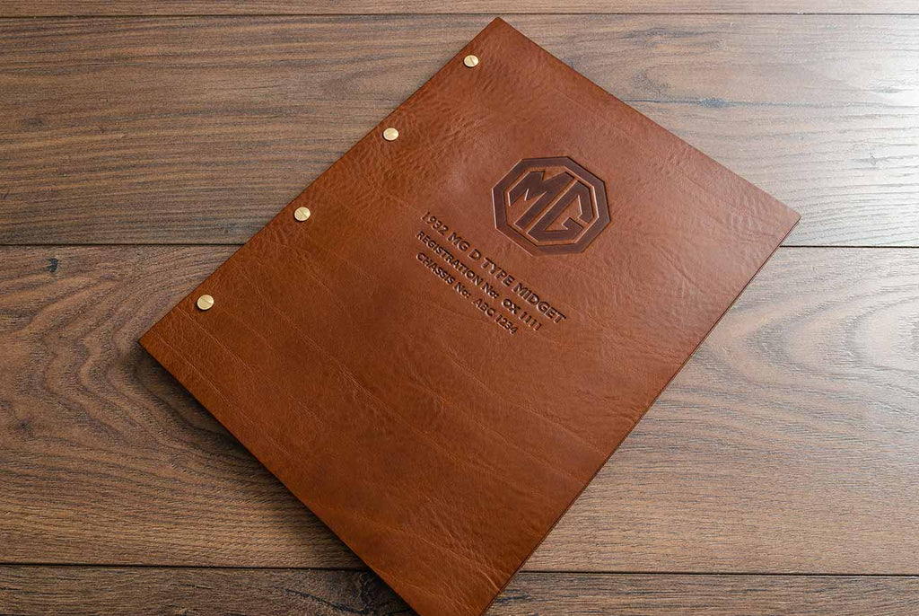 Brown leather personalised MG motor vehicle service history and document folder