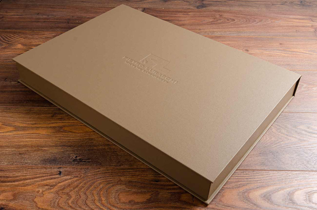 A2 clamshell box for photographer with personalised cover with blind debossed logo