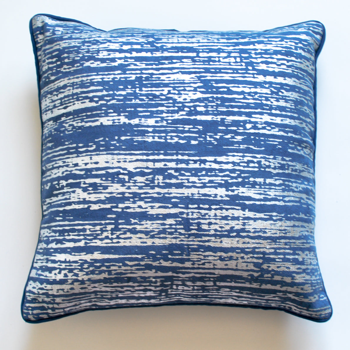 blue and silver pillows