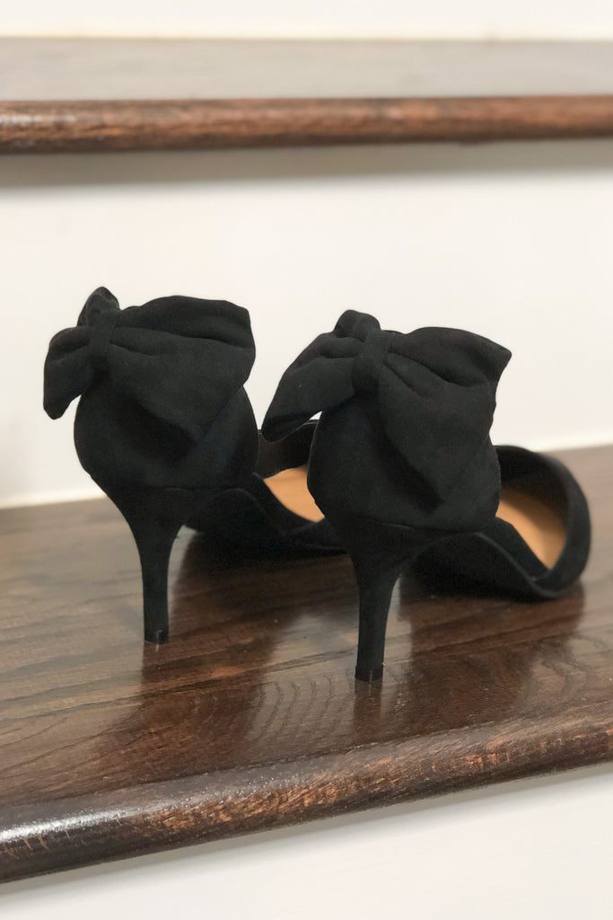 heels with bow on back