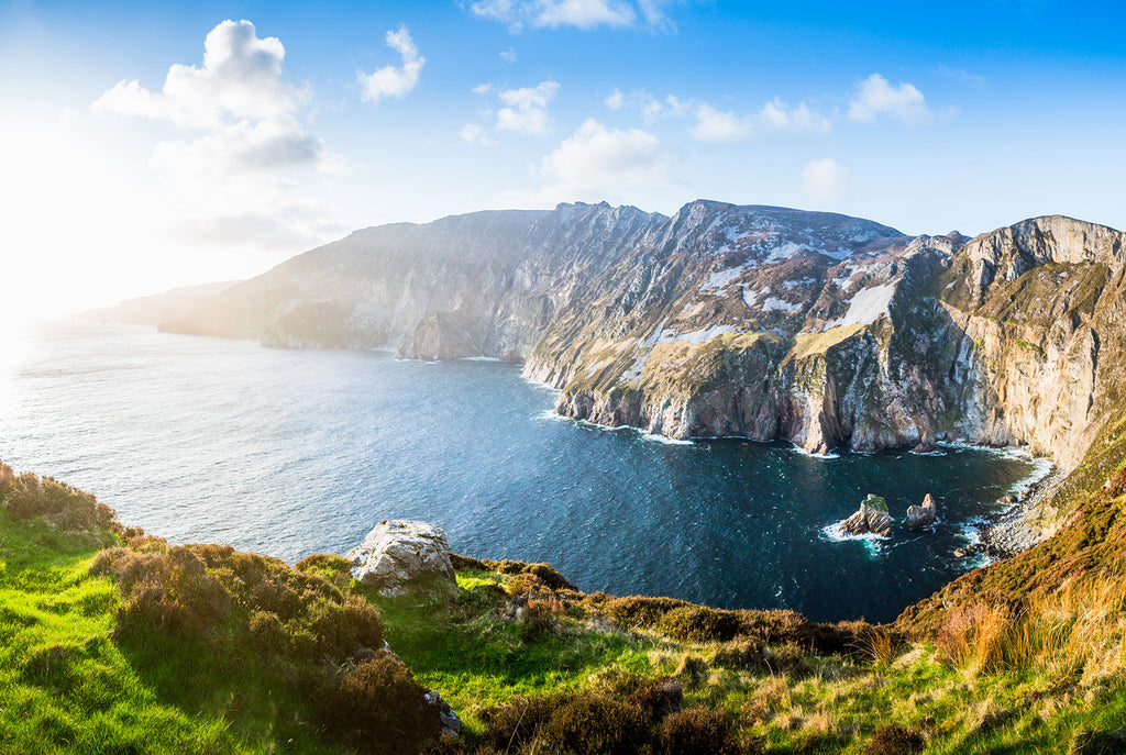 A beautiful coastline view of the famous Slieve League Cliffs on a sunny day near Carrick, County Donegal, Ireland. 