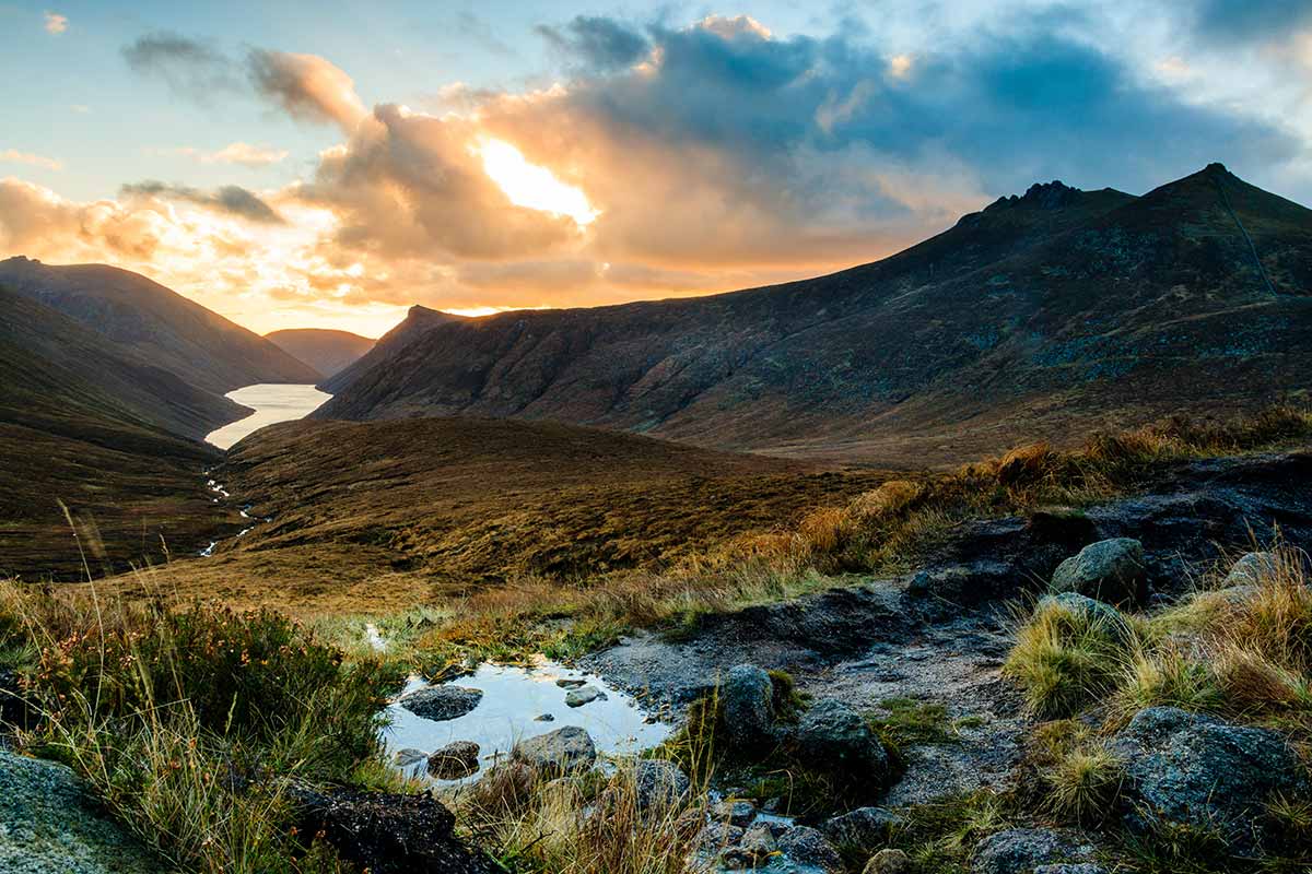 A sunset view over Ben Crom reservoir in the Mourne Mountains, County Down, Northern Ireland. 