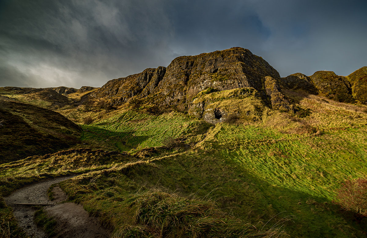 The beautiful green, brown and yellow Cave Hill in Belfast, Northern Ireland on an overcast day