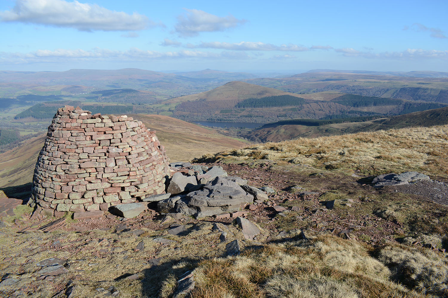 Cairn Pica above Talybont reservoir. looking west over the Black Mountain range