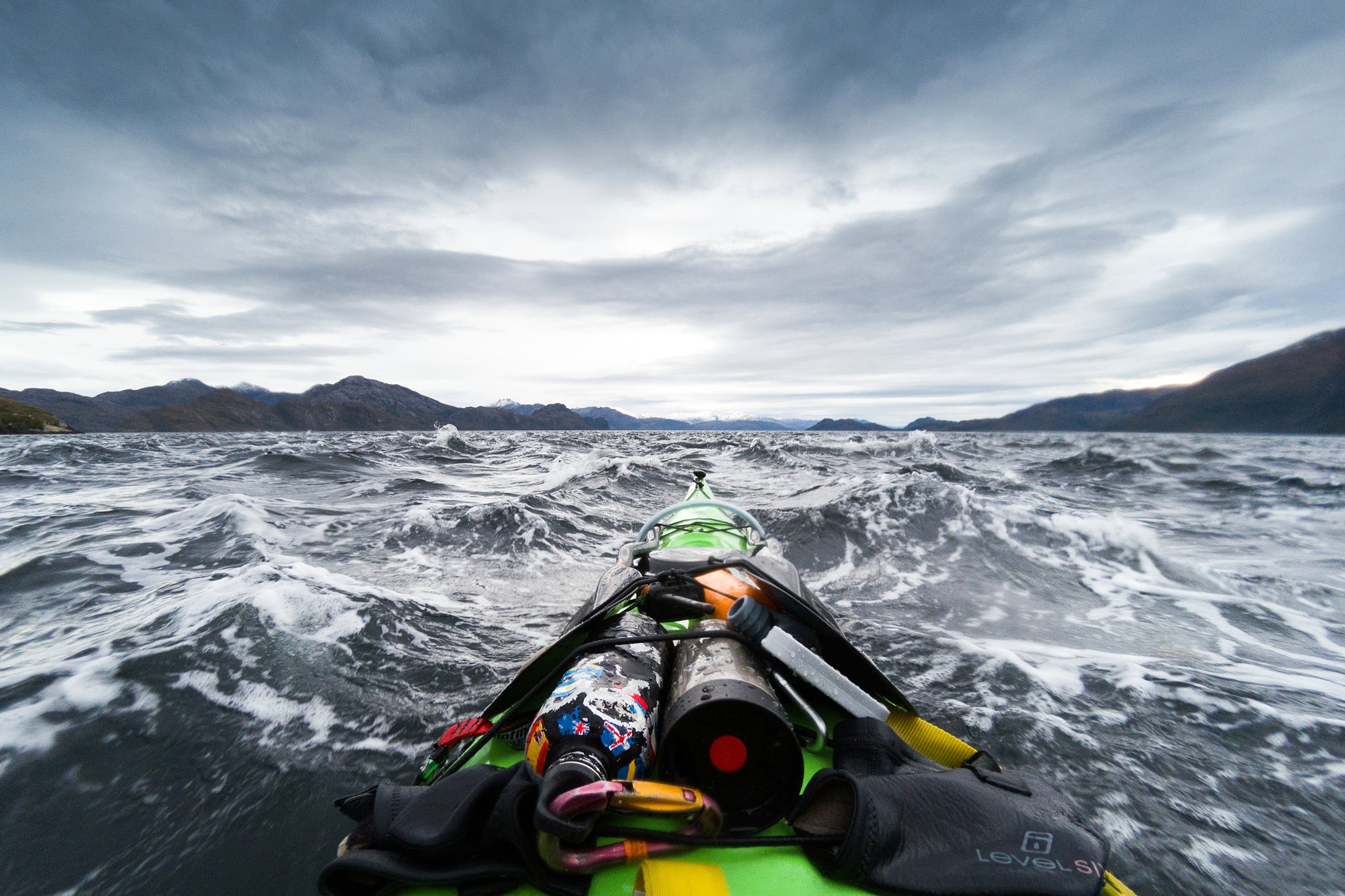 POV GoPro shot of a fully laden kayak heading into choppy South Atlantic waters