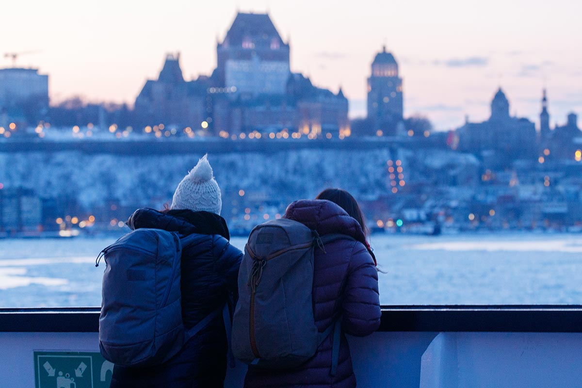 Couple wearing backpacks