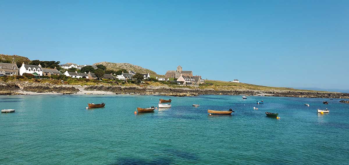 Boats moored off the island of Iona.