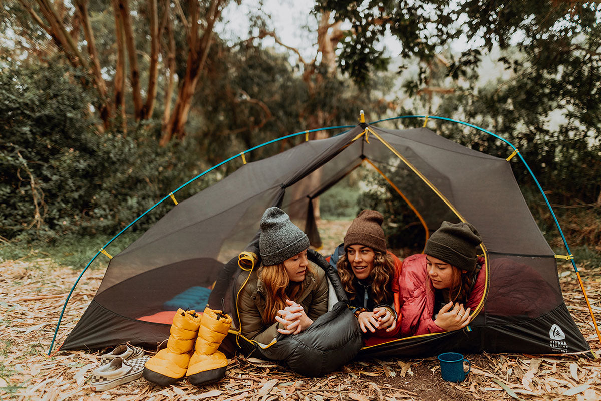 Sierra Designs tent, three woman in the tent