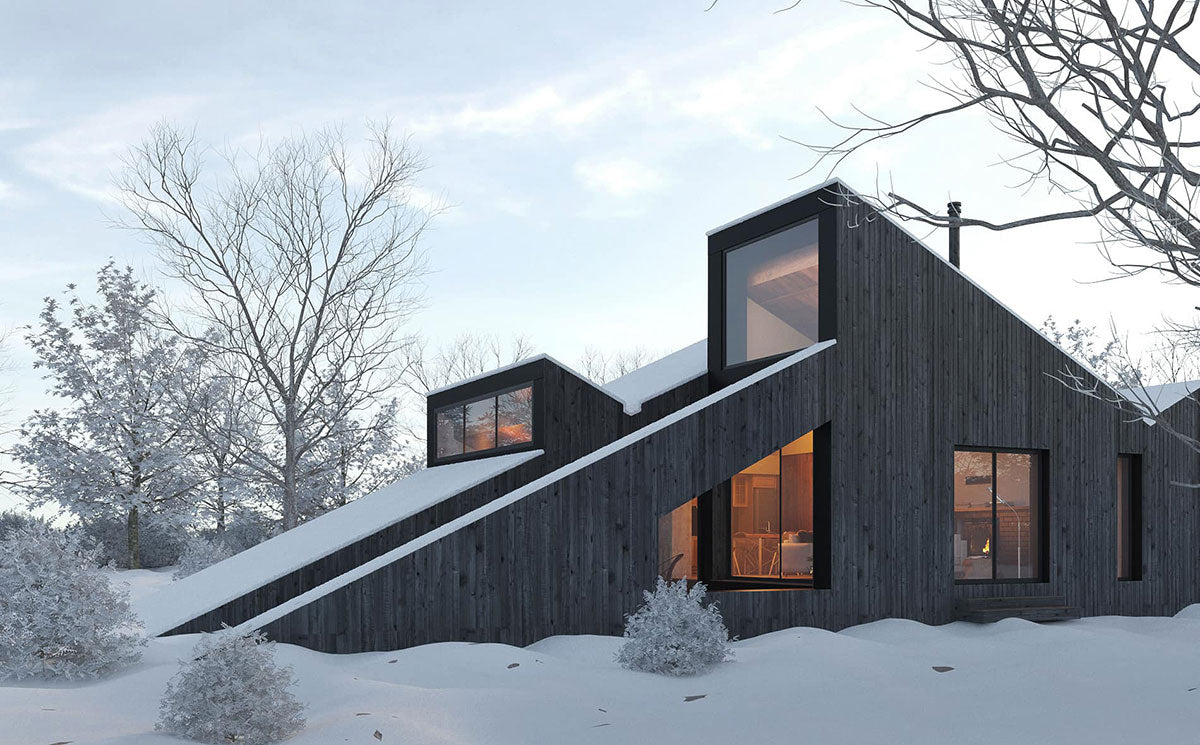 This angular ski lodge is partially sunken in the snow and hidden in a forest just outside Lillehammer, Norway.