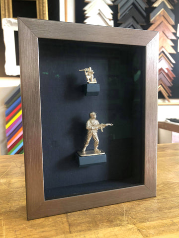 silver toy soldiers framed. 