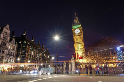 big ben london england uk at night time with bright lights 