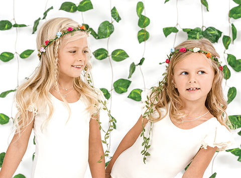 young girls with flowers in their hair wearing bo and bala sterling silver kids necklaces in nz