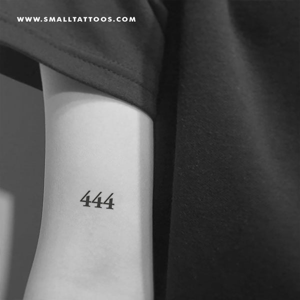 Tattoo of the number 444 located on the neck