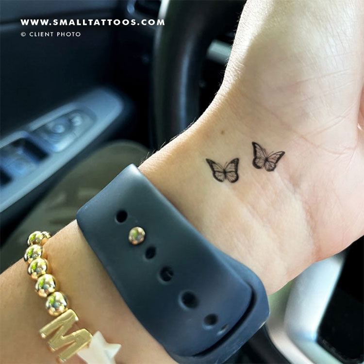 small butterfly tattoos on hand