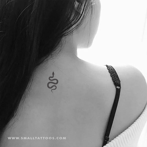 Skye Ink Tattoo Studio on Instagram Awesome minimalist snake tattoo by  sandyarttattoo  Looking for minimalist designs We got you covered  Hit the link in our bio to ge