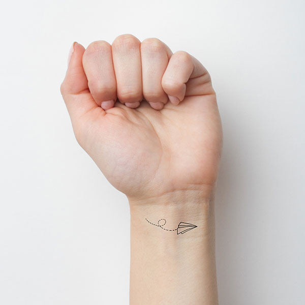 paper airplane tattoo