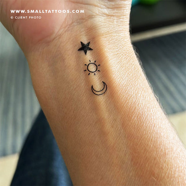 Matching sun moon and star tattoos for mother and