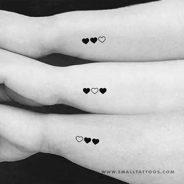 The Tattoo Den  Three sisters came in for four hearts one coloured black  to represent oldest to youngest The fourth sister lives some distance away  and had hers done locally Plus