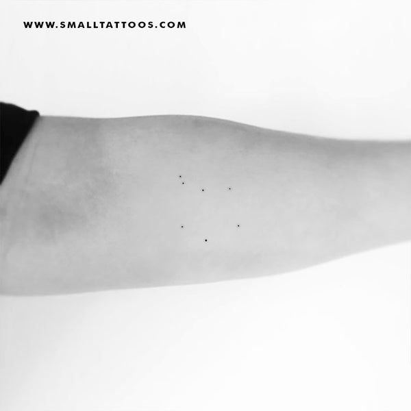 Minimalist Libra constellation tattoo on the inner
