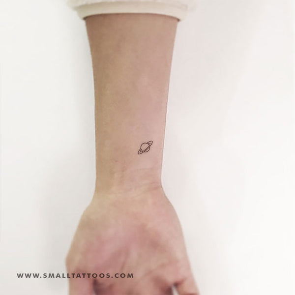 The tiniest Saturn on the sweetest Michelle  gypsyrosetattoo  saturntattoo planettattoo tinytattoo cutetattoo   Saturn tattoo  Planet tattoos Small tattoos