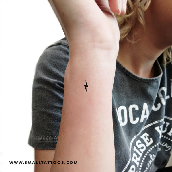 Micro lightning bolt tattoo by Melanie Benyahya  Tattoogridnet