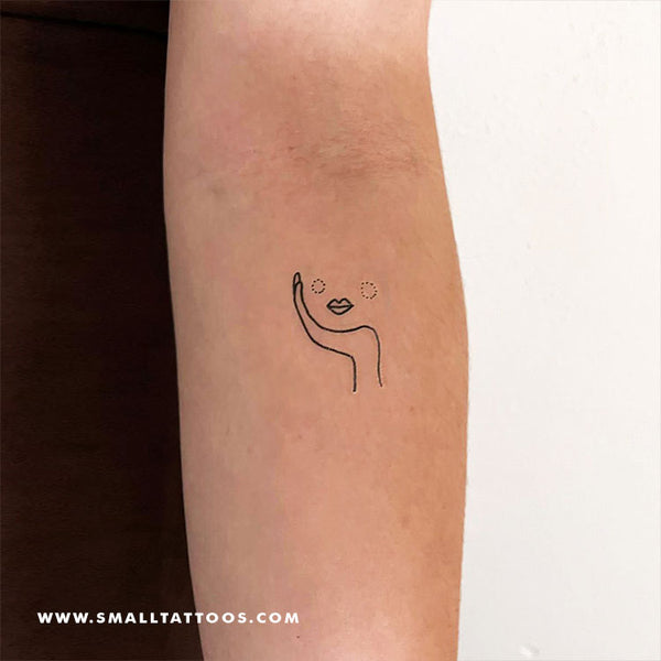 Continuous line woman silhouette tattoo on the back of