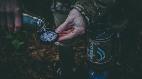 pouring water on a paper aeropress filter