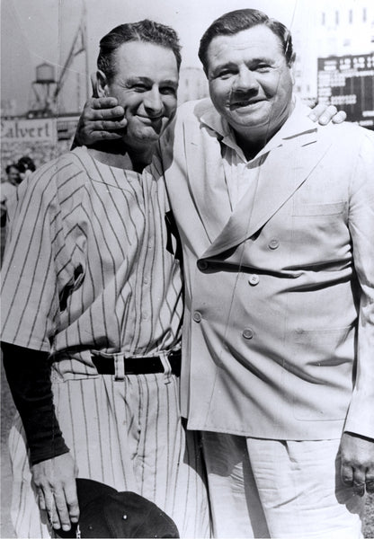 Lou Gehrig and Babe Ruth stand together with their arms around each other's shoulders.