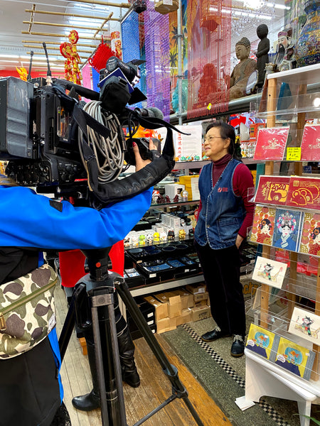 Mrs. Chen speaks with Cindy Hsu on camera in Pearl River's Tribeca store