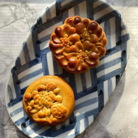 Vietnamese mooncakes on blue and white dish