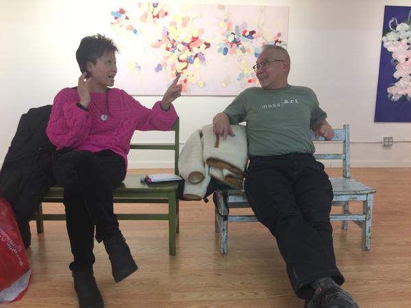 Mee Mee Chin and Arlan Huang chatting in Pearl River art gallery