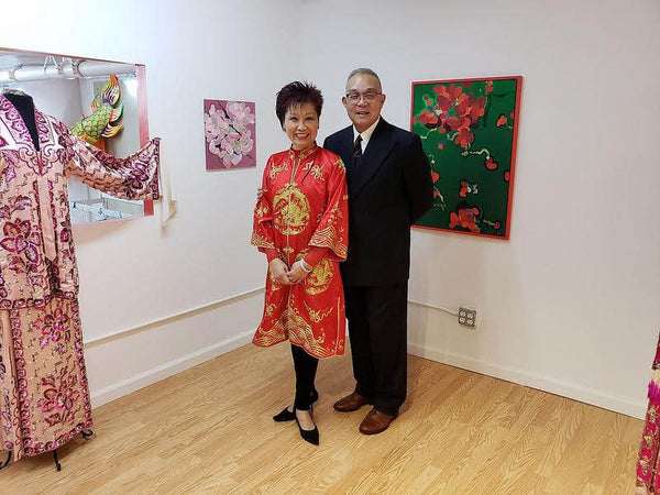 Mee Mee Chin and Arlan Huang in the Pearl River art gallery during their opening reception