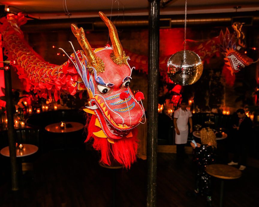 Large red dragon hanging in restaurant