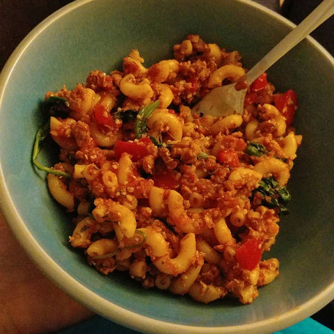 A bowl of "American chop suey," or macaroni, ground beef, tomato sauce, and vegetables