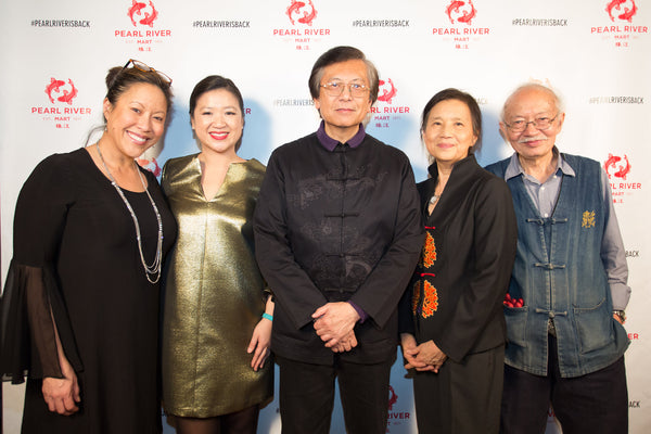 Corky Lee with the Chens, Joanne Kwong, and Cindy Hsu at his exhibition opening