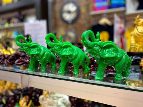 Green elephant figurines