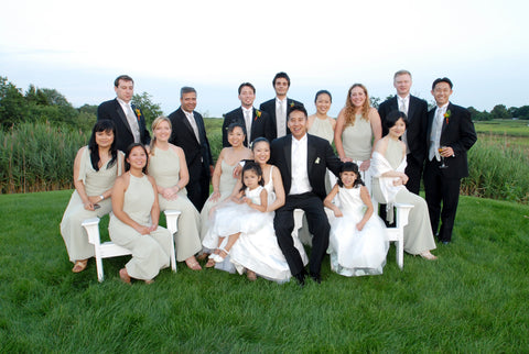 Wedding party outside on green grass