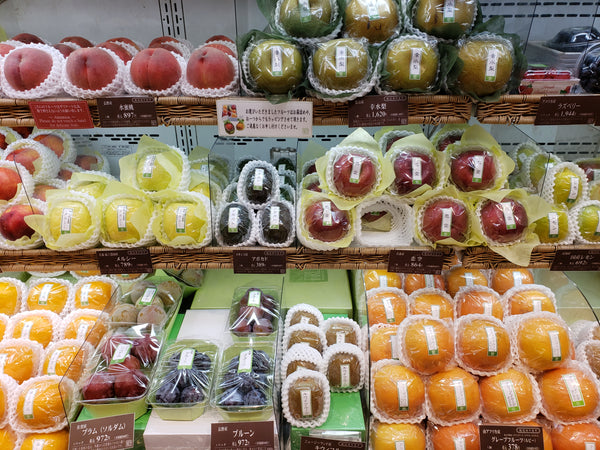 A display of beautifully wrapped fruit