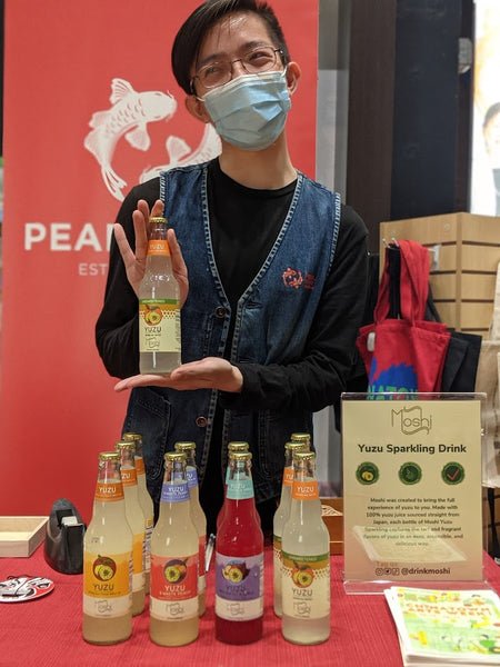 Pearl River staff Kenneth Ho with Moshi drinks