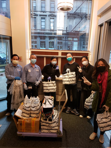 With the maintenance staff and administration at Charles B. Wang health center