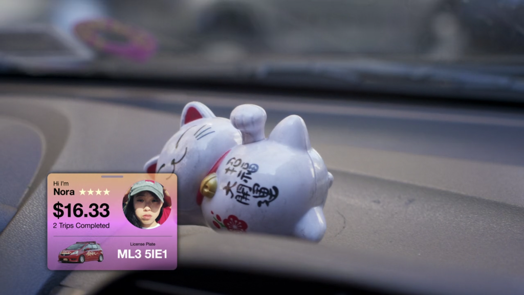 White lucky cat on dashboard