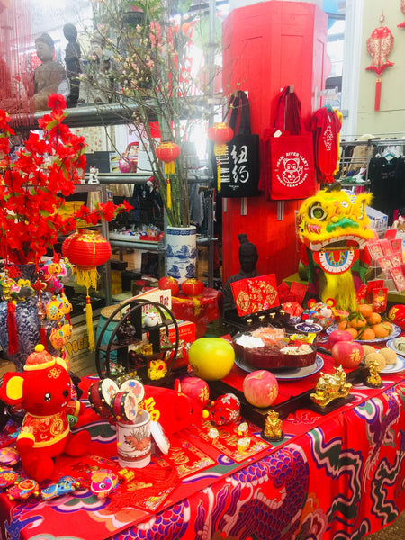 Beautiful table display of Lunar New Year decorations and food