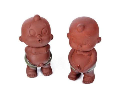 Pee-Pee Boy clay figurines