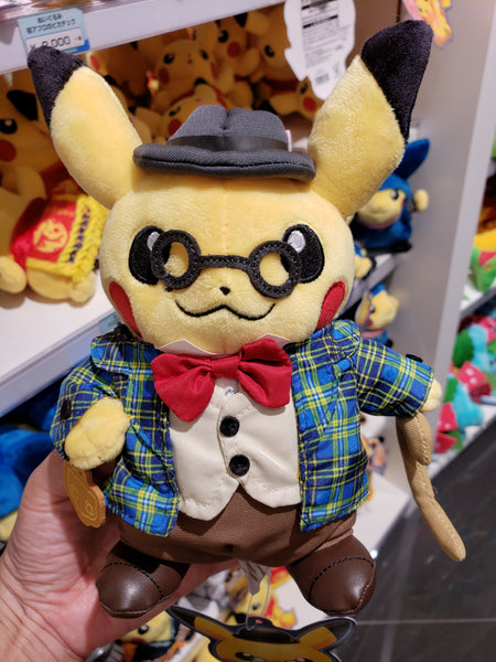 A Pikachu plushie dressed in "gentleman" fashion