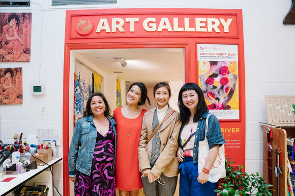 Soft Solidarity curator and artists at Pearl River Soho gallery