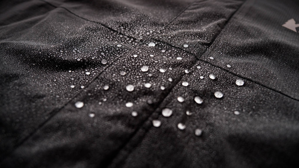 GEAR AID DWR Durable Water Repellent on a black jacket