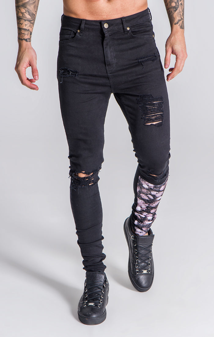 black ripped jeans with roses