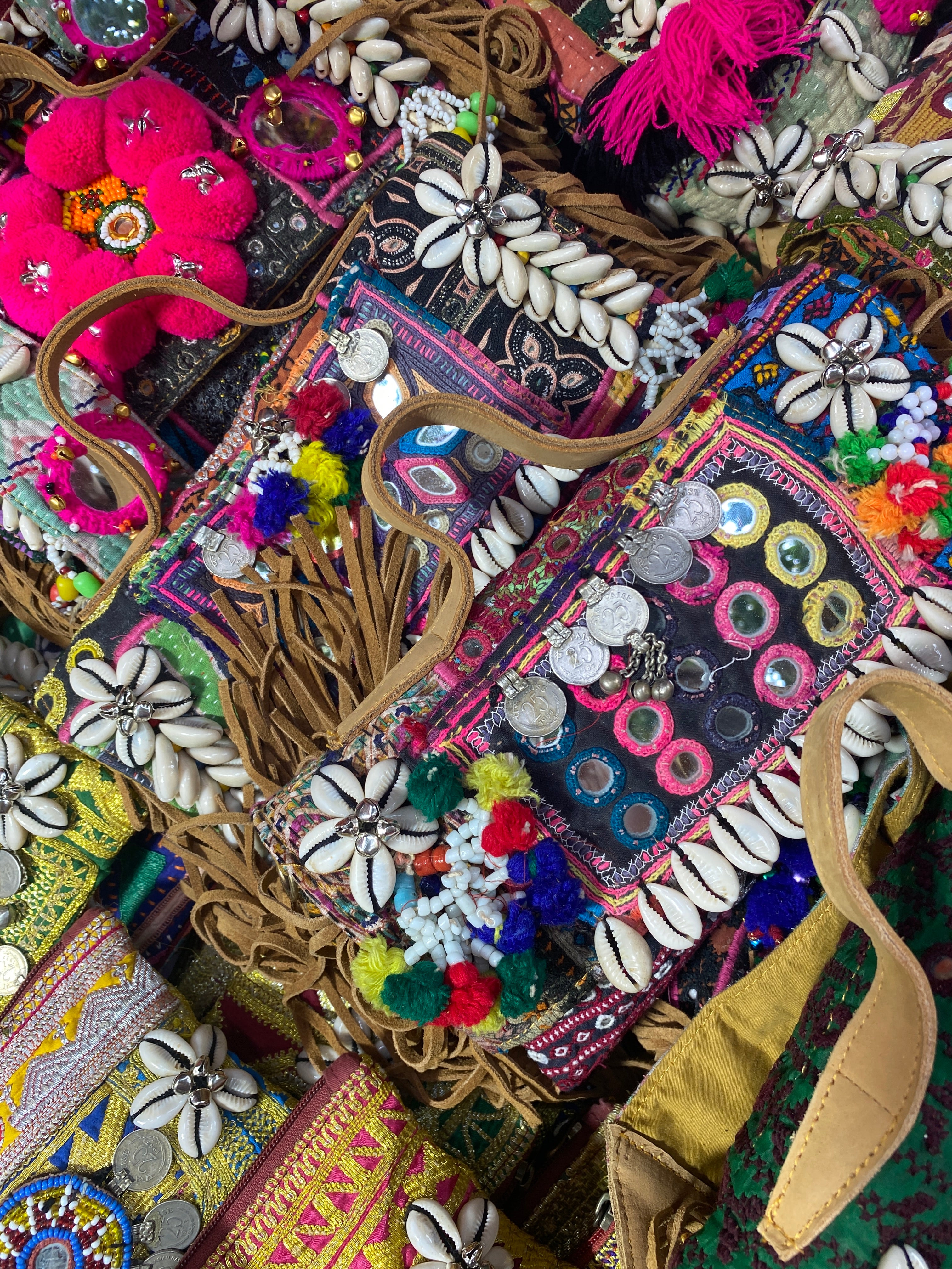 Bags and accessories with intricate colourful detailing from Jaipur