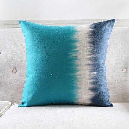 navy blue and white cushions